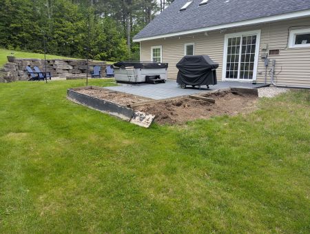 Spacious concrete paver patio outdoor living